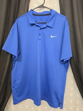 Nike Men’s Blue Polo Shirt with White Swoosh